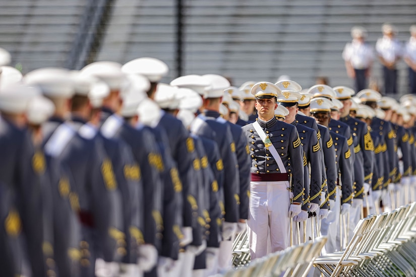 Cadets stand at attention.