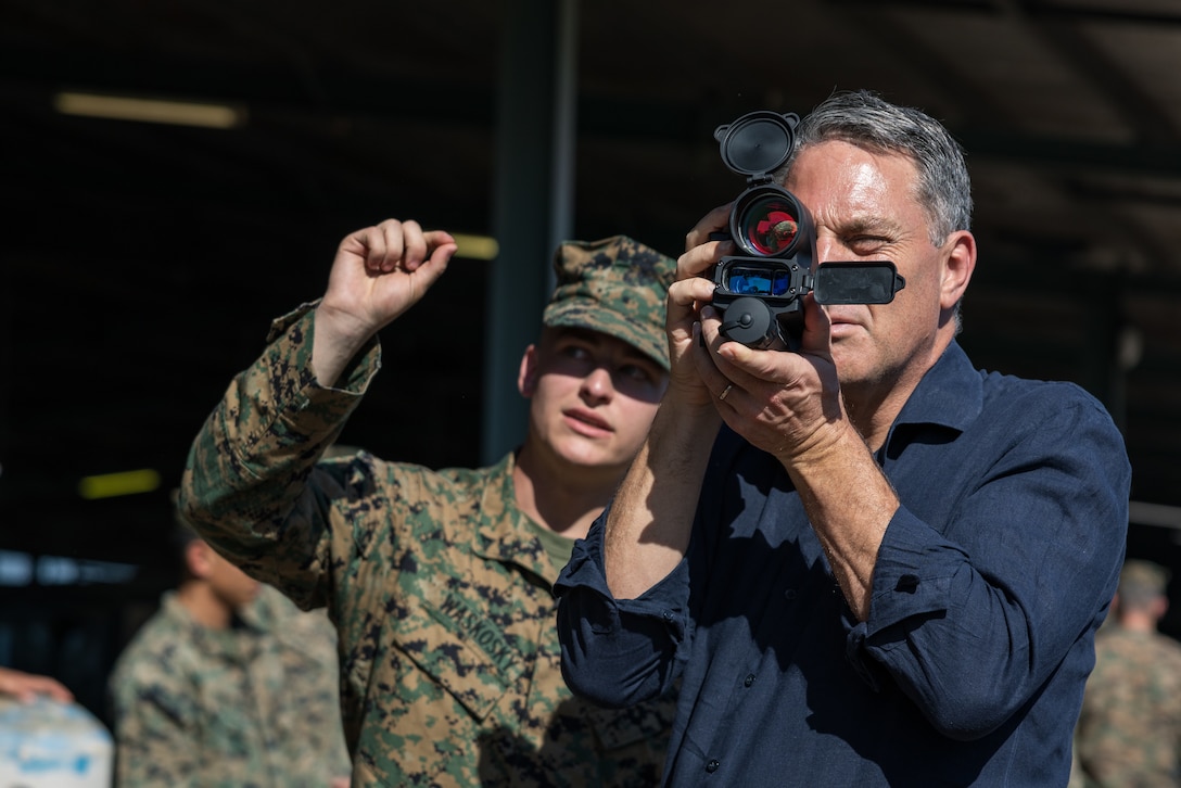 U.S. Marine Corps Lance Cpl. Ryan Waskosky, left, a rifleman with Fox Company, 2nd Battalion, 5th Marine Regiment (Reinforced), Marine Rotational Force – Darwin 24.3, shows Australian Deputy Prime Minister Richard Marles how to use the optic of an M3E1 multipurpose anti-armor anti-personnel weapon at Robertson Barracks, Darwin, NT, Australia, May 22, 2024. During a visit to Darwin, Marles met with key leadership from both the Australian Defence Force and MRF-D, as well as individual Marines, to better understand the improvements in interoperability MRF-D has made in partnership with our ADF Allies. Waskosky is a native of Idaho. (U.S. Marine Corps photo by Cpl. Earik Barton)