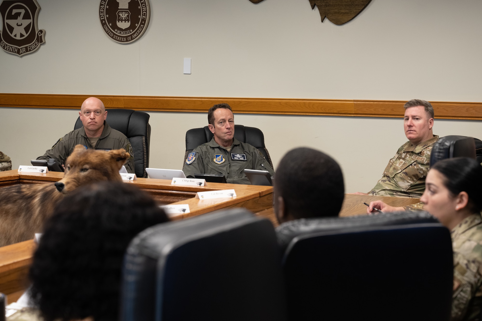 From the left, Col. Matthew Gaetke, 8th Fighter Wing commander, Lt. Gen. David Iverson, 7th Air Force commander, and Chief Master Sgt. Jeremiah Ross, 7th AF command chief, receive a brief from the Quality-of-Life Task Force during their visit at Kunsan Air Base, Republic of Korea.