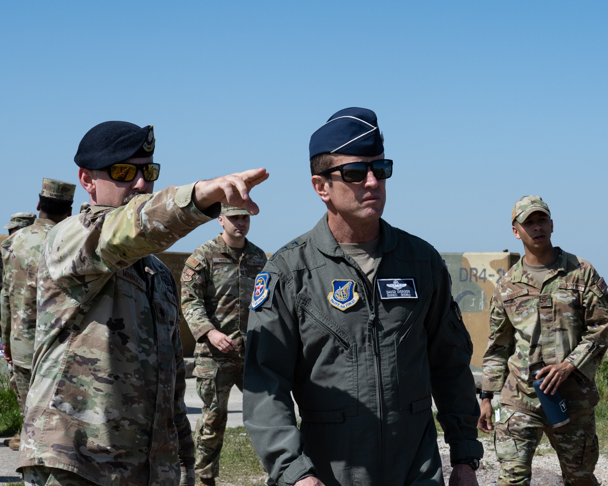 Lt. Col. Daniel Minnocci, left, 8th Security Forces Squadron commander, points out distant features around the perimeter of the base to Lt. Gen. David Iverson, 7th Air Force commander, during 7th AF command team’s visit at Kunsan Air Base, Republic of Korea.