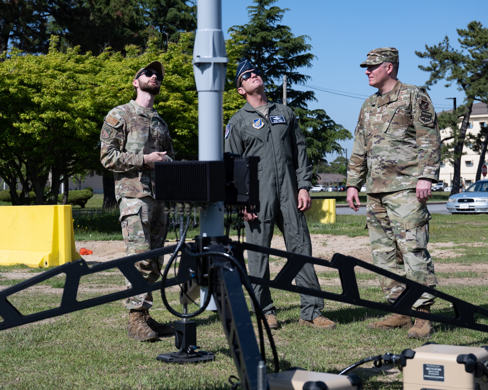 Lt. Gen. David Iverson, 7th Air Force commander, and Chief Master Sgt. Jeremiah Ross, 7th AF command chief, receive a briefing from Staff Sgt. John Hailstead, 8th Security Forces Squadron physical security resource protection, during their visit at Kunsan Air Base, Republic of Korea.