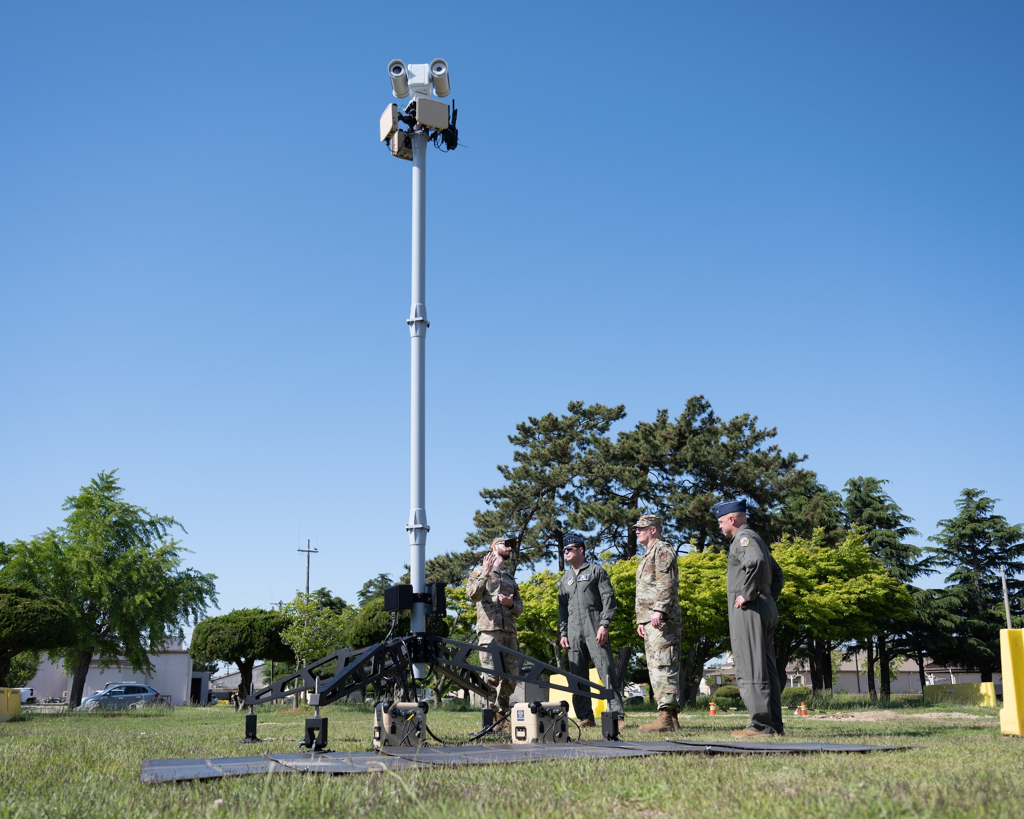 Lt. Gen. David Iverson, 7th Air Force commander, receives a briefing from Staff Sgt. John Hailstead, 8th Security Forces Squadron physical security resource protection, during their visit at Kunsan Air Base, Republic of Korea.