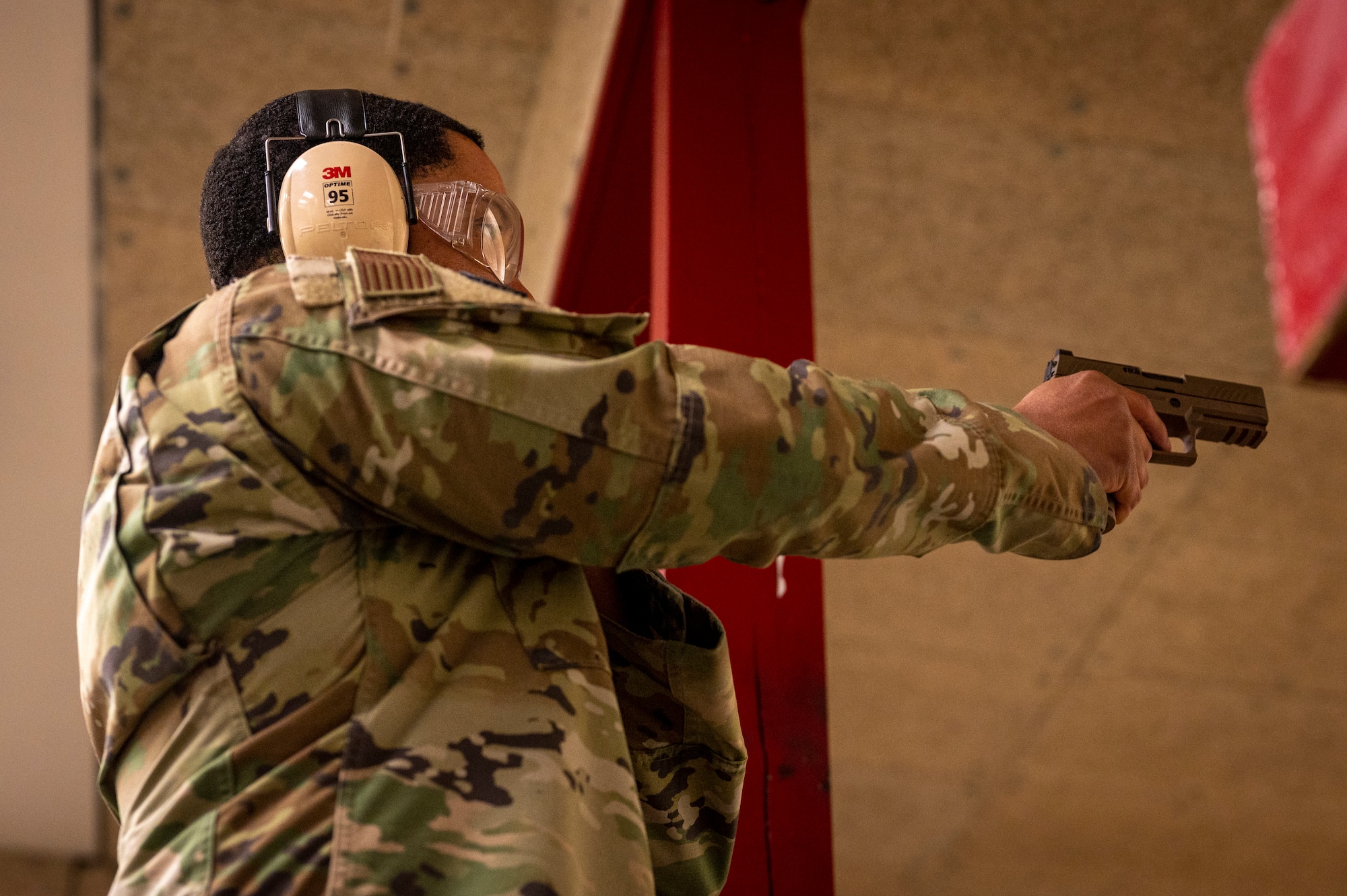 U.S. Air Force Tech. Sgt. Antwuan Jamison, 51st Logistics Readiness Squadron non-commission officer in charge of outbound cargo, competes in a Combat Arms Training and Maintenance competition, during National Police Week at Osan Air Base, Republic of Korea, May 20, 2024. The event allowed participants to train and hone their marksmanship skills. (U.S. Air Force photo by Senior Airman Sabrina Fuller-Judd)