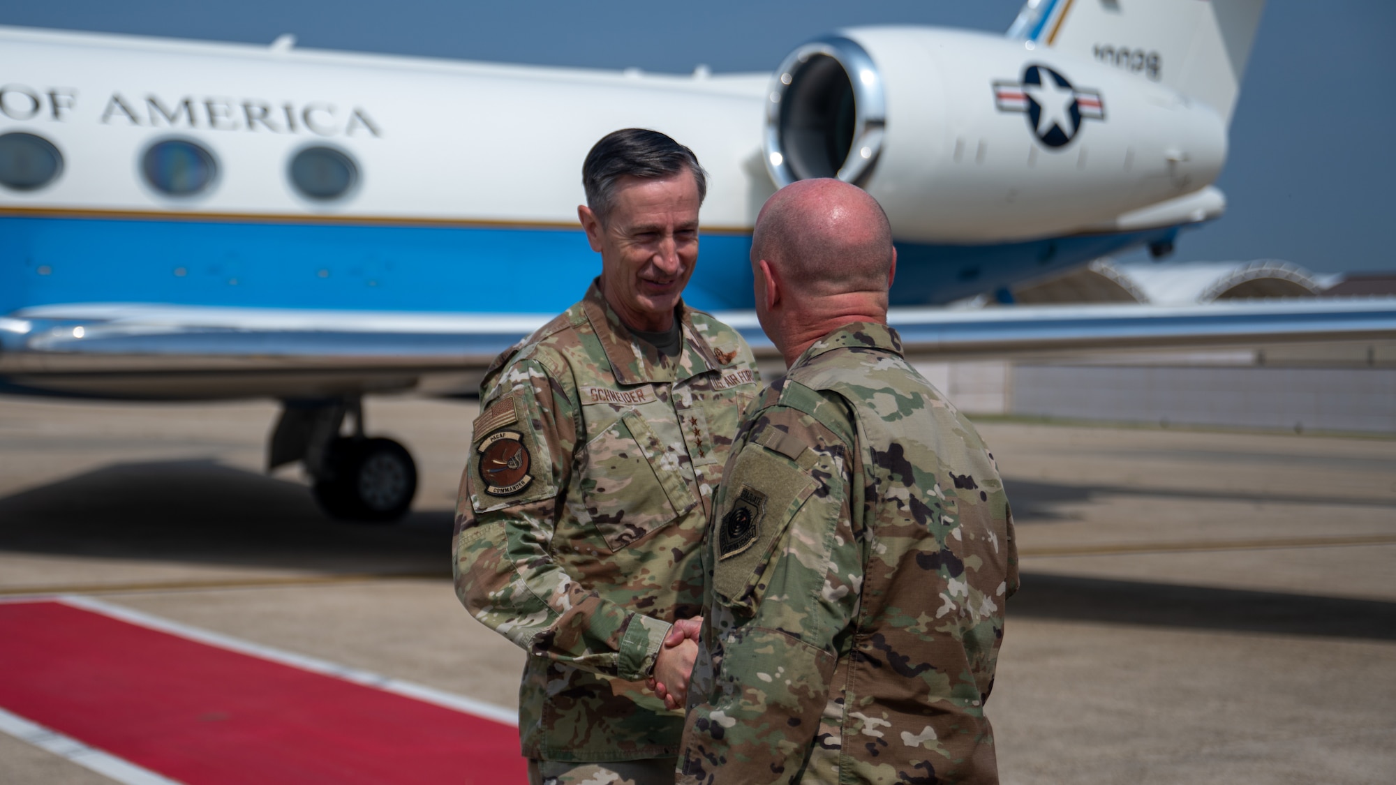 Gen. Schneider is greeted by Col. Gaetke after arriving at Kunsan Air Base.