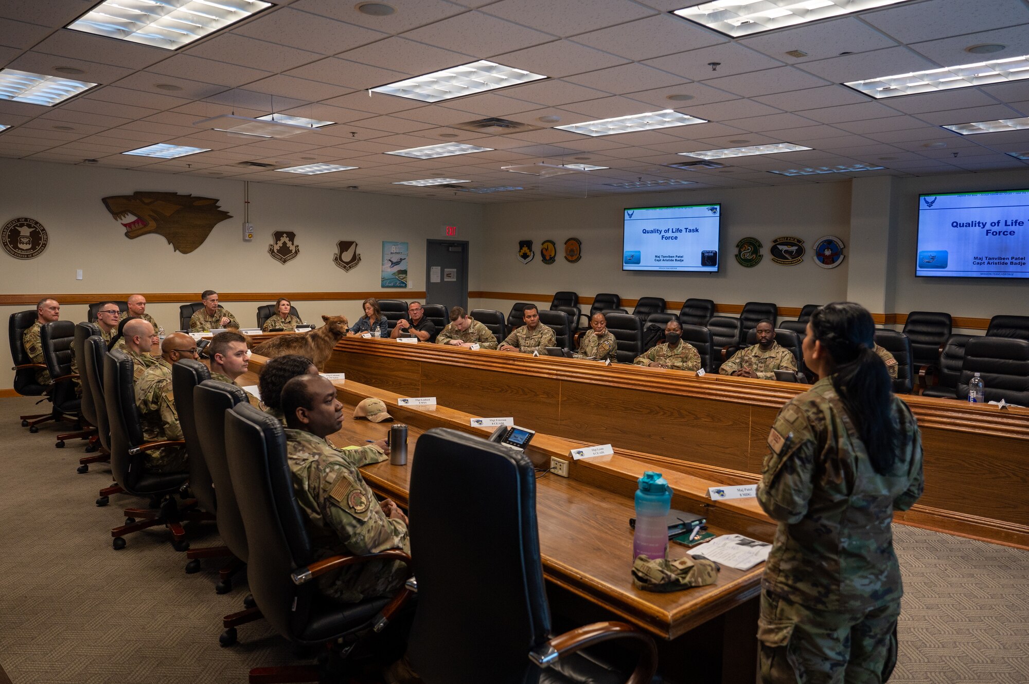 Members of the Kunsan Quality of Life Task Force provide updates to Gen. Kevin Schneider.