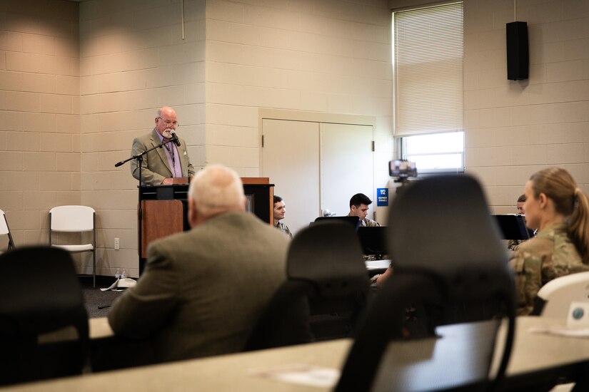 Mr. Joe Sanderson, the director of facilities for the Kentucky Department of Military Affairs, spoke to friends and family of retired Chief Warrant Officer 5 Joe Wilkins at Wendell H. Ford Regional Training Center in Greenville, Kentucky on May 21, 2024. Sanderson was the master of ceremonies for the headquarters building renaming ceremony in honor of Wilkins service to the Kentucky Army National Guard. (U.S. Army National Guard photo by Andy Dickson)