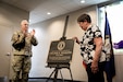Frances Wilkins, widow of Chief Warrant Officer 5 Joe Wilkins, holds the plaque for the building renaming in remembrance of Joe Wilkins at Wendell H. Ford Regional Training Center (WHFRTC) in Greenville, Kentucky on May 24, 2024. Joe Wilkins was one of the three full-time employees who made WHFRTC a major state training site. (U.S. Army National Guard photo by Andy Dickson)