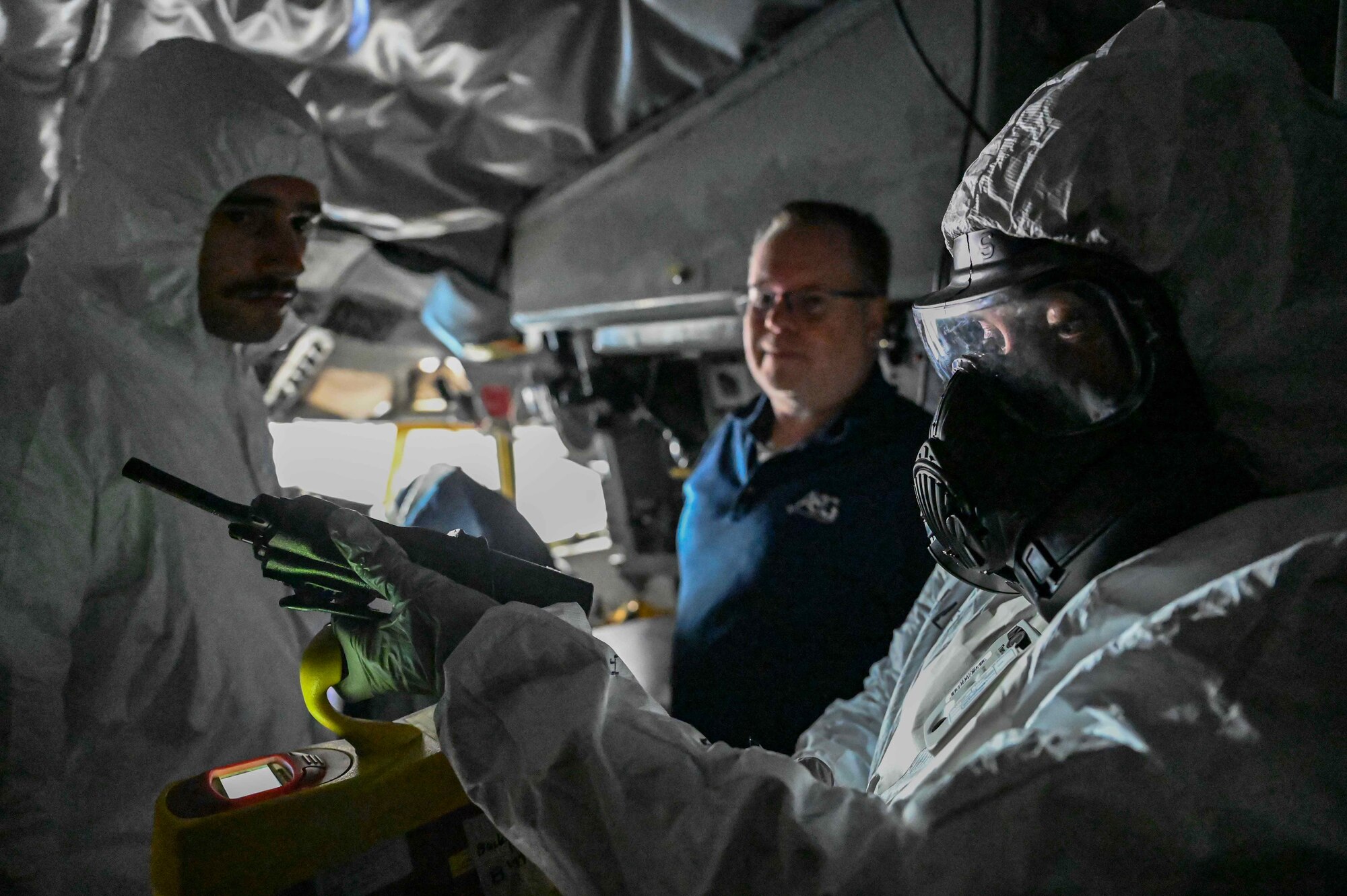 U.S. Air Force Airman 1st Class Lauren Atchely, 48th Fighter Wing bioenvironmental engineering technician, uses an ADM-300 survey meter device during exercise Radiant Falcon at Royal Air Force Mildenhall, England, May 23, 2024. The ADM-300 system is used to measure radiation levels during radiological contamination detection and decontamination scenarios. (U.S. Air Force photo by Senior Airman Viviam Chi