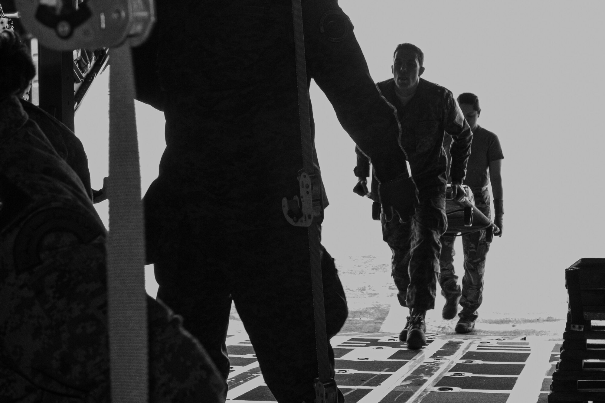 U.S. Air Force personnel assigned to the 86th Aeromedical Evacuation Squadron based in Ramstein, Germany, transport a simulated casualty inside a Tunisian C-130 aircraft during aeromedical evacuation training at exercise African Lion 2024 (AL24) in Tunis, Tunisia, May 2, 2024. AL24 marks the 20th anniversary of U.S. Africa Command’s premier joint exercise led by U.S. Army Southern European Task Force, Africa (SETAF-AF), running from April 19 to May 31 across Ghana, Morocco, Senegal and Tunisia, with over 8,100 participants from 27 nations and NATO contingents. (U.S. Army photo by Maj. Joe Legros)
