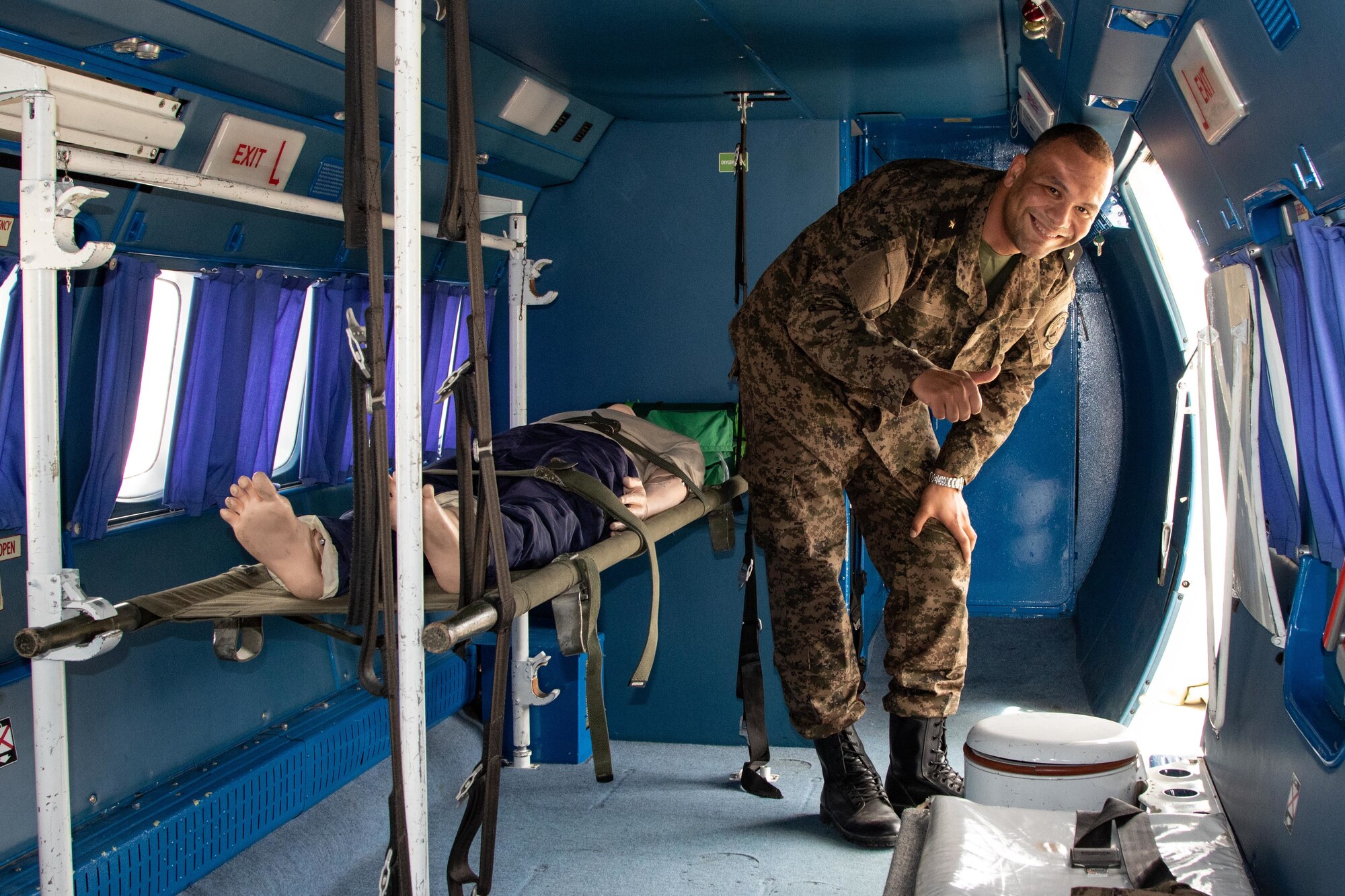 A member of the Tunisian Armed Forces gives a thumbs up while aboard a Tunisian L-410 Turbolet during aeromedical evacuation training at exercise African Lion 2024 (AL24) in Tunis, Tunisia, May 2, 2024. AL24 marks the 20th anniversary of U.S. Africa Command’s premier joint exercise led by U.S. Army Southern European Task Force, Africa (SETAF-AF), running from April 19 to May 31 across Ghana, Morocco, Senegal and Tunisia, with over 8,100 participants from 27 nations and NATO contingents. (U.S. Army photo by Maj. Joe Legros)