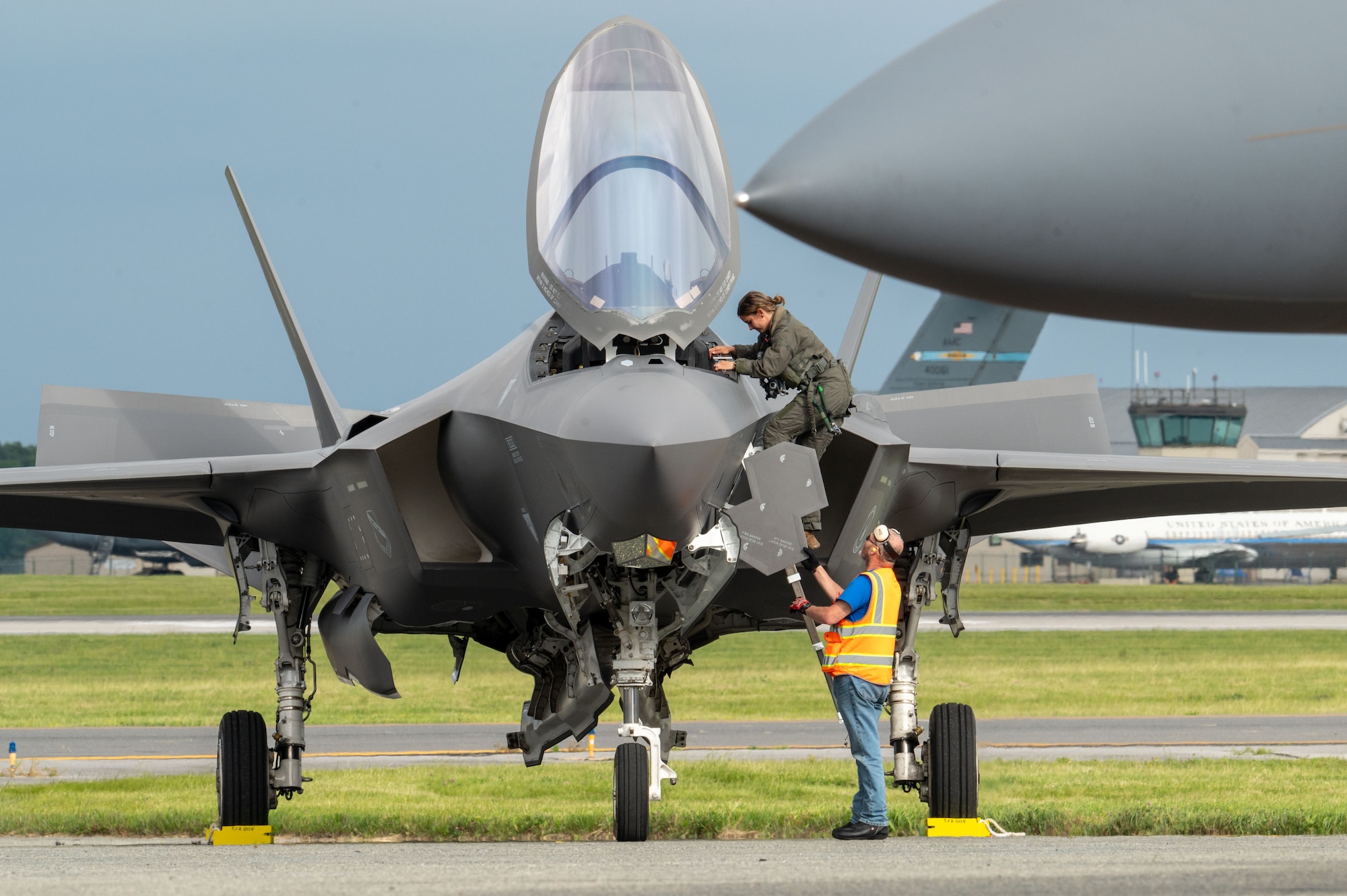 U.S. Air Force Capt. Melanie “MACH” Kluesner, F-35A Lightning II Demonstration Team pilot and commander, exits an F-35A before the 2024 First State Airshow at Dover Air Force Base, Delaware, May 16, 2024. The First State Airshow was a free, two-day event open to the public that featured 23 static displays and 18 aerial performers. (U.S. Air Force photo by Airman Liberty Matthews)