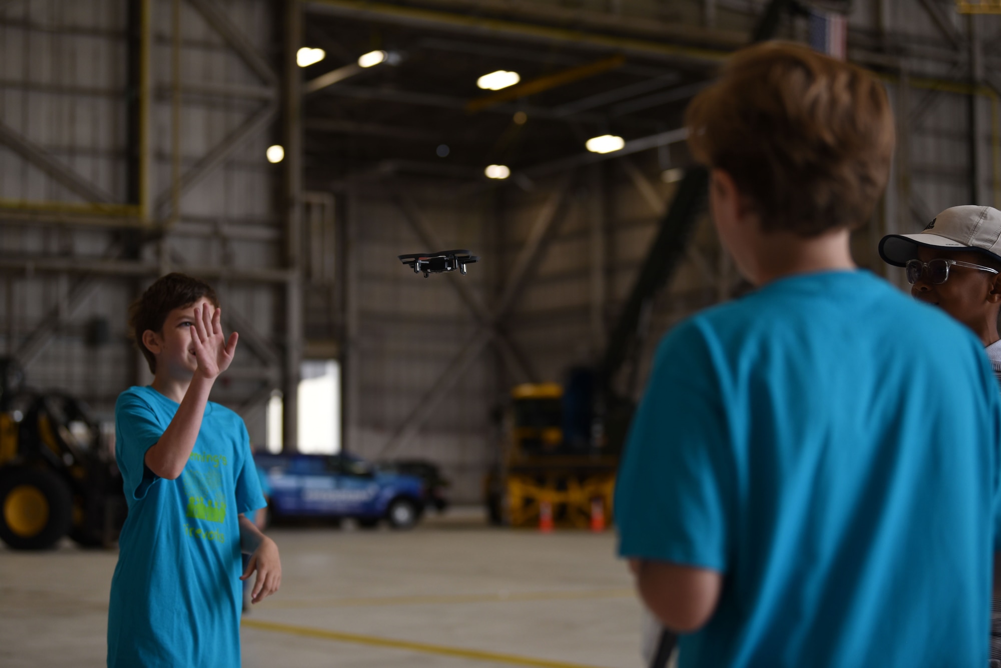 Students fly a drone during a science, technology, engineering, and mathematics (STEM) demonstration at the 2024 First State Airshow at Dover Air Force Base, Delaware, May 17, 2024. The Department of Defense's STEM mission is to inspire, cultivate, and develop exceptional talent through a continuum of opportunities, enriching current and future Department of Defense workforce. (U.S. Air Force photo by Staff Sgt. Deven Schultz)