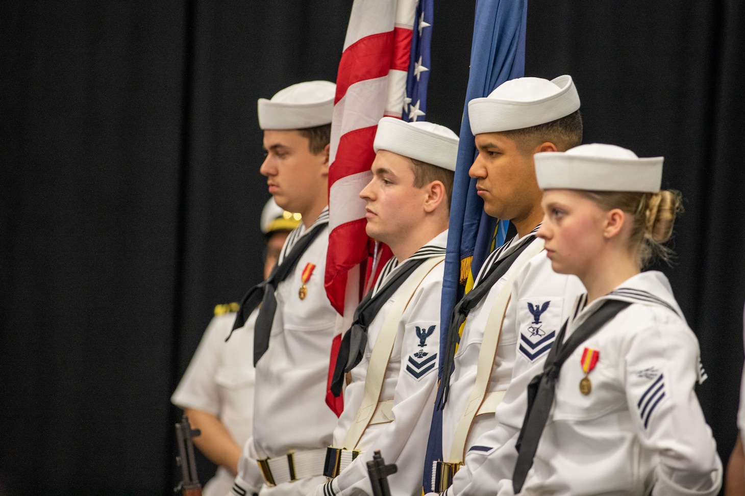 Iwo Jima is moored at Naval Station Norfolk in Norfolk, Virginia, at the end of her scheduled maintenance period. The change of command ceremony is a traditional Navy ceremony where the ship's crew witness the transfer of power from the commanding officer to the prospective commanding officer.