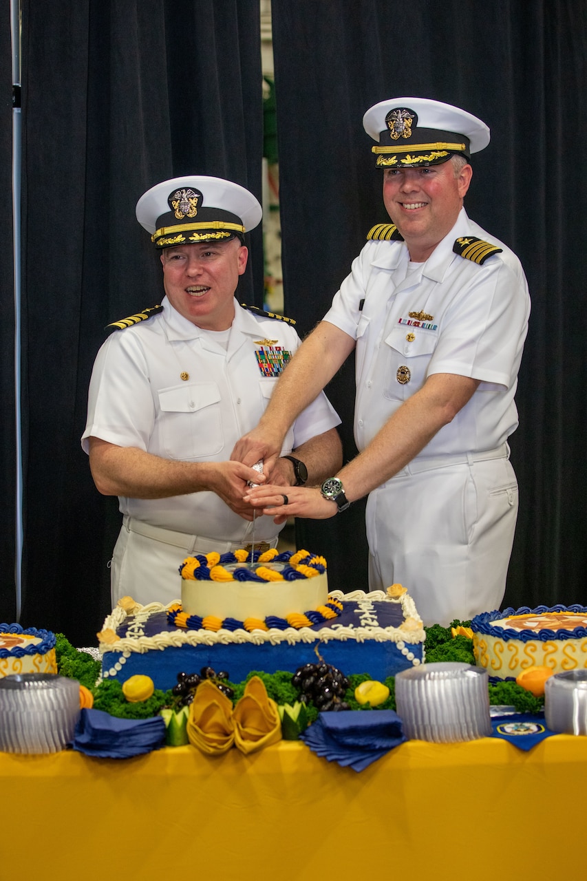 Iwo Jima is moored at Naval Station Norfolk in Norfolk, Virginia, at the end of her scheduled maintenance period. The change of command ceremony is a traditional Navy ceremony where the ship's crew witness the transfer of power from the commanding officer to the prospective commanding officer.