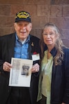 William Sivelle, POW/MIA family member and World War II veteran, poses for a photo with his wife, Leigh, during a Defense POW/MIA Accounting Agency (DPAA) Family Member Update (FMU) in Billings, Montana, May 18, 2024. Sivelle attended the event to receive a one-on-one briefing on his cousin, U.S. Army Air Forces Pfc. Richard J. Sivell, a World War II POW who remains unaccounted-for. FMUs include formal presentations, question-and-answer sessions, and one-on-one discussions designed to keep family members informed of DPAA’s mission to account for those still missing while addressing their individual needs. (U.S. Air Force photo by Staff Sgt. Blake Gonzales)