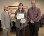 Photo of Rebecca Pope receiving her award