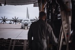 Staff Sgt. Skyler Buyce, a loadmaster with the 109th Airlift Wing, conducts post-flight checks in Kangerlussuaq, Greenland, on May 13, 2024.
