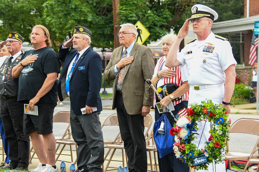 People saluting.