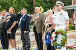 People saluting.