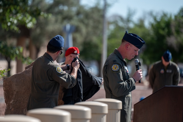 U.S. Air Force Col. Charles Fallon, commandant of the U.S. Air Force Weapons School, delivers a speech for the school’s 75th anniversary dedication ceremony at Nellis Air Force Base, Nevada, May 17, 2024.