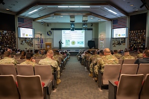 U.S. Air Force Col. Charles Fallon, U.S. Air Force Weapons School (USAFWS) commandant, conducts a mission brief at Nellis Air Force Base, Nevada, May 17, 2024.