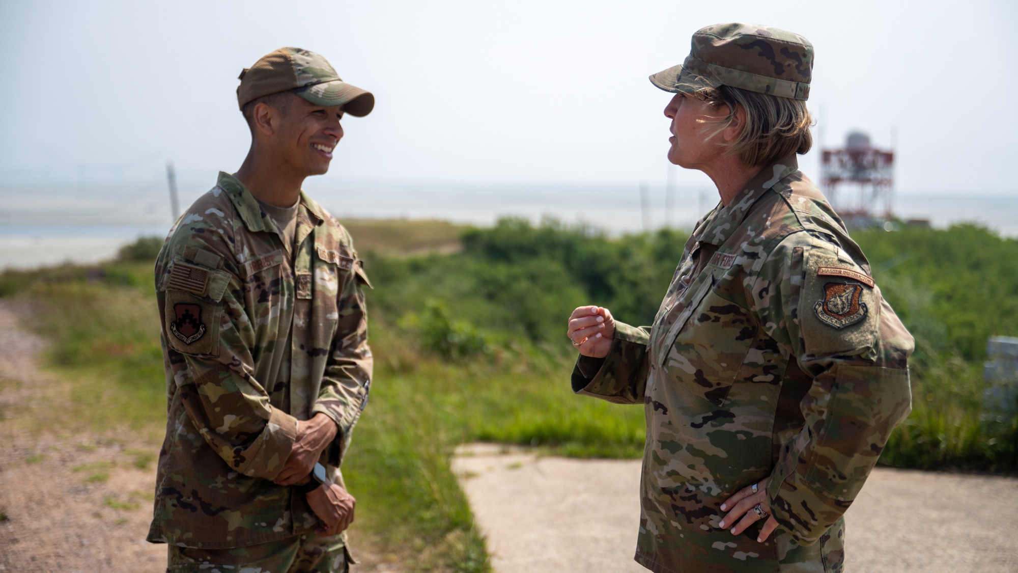 Chief Master Sgt. Kathleen McCool speaks to Staff Sgt. Bryson Forrest.