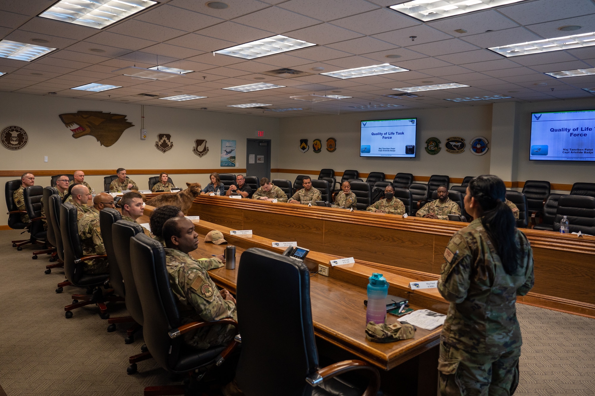Members of the Kunsan Quality of Life Task Force provide updates to Gen. Kevin Schneider.