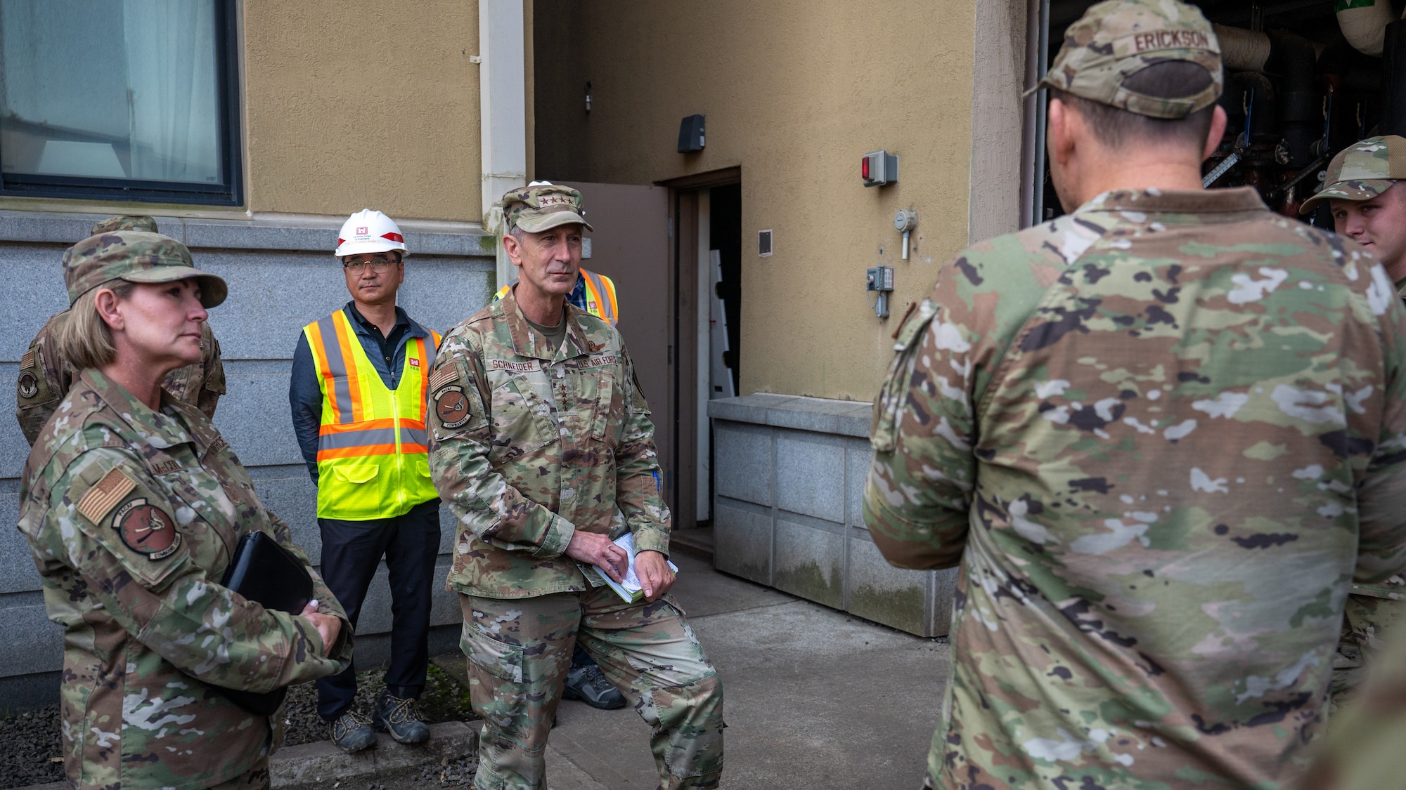 Gen. Schneider and Chief McCool, receive a briefing on heating, ventilation, and air conditioning systems.