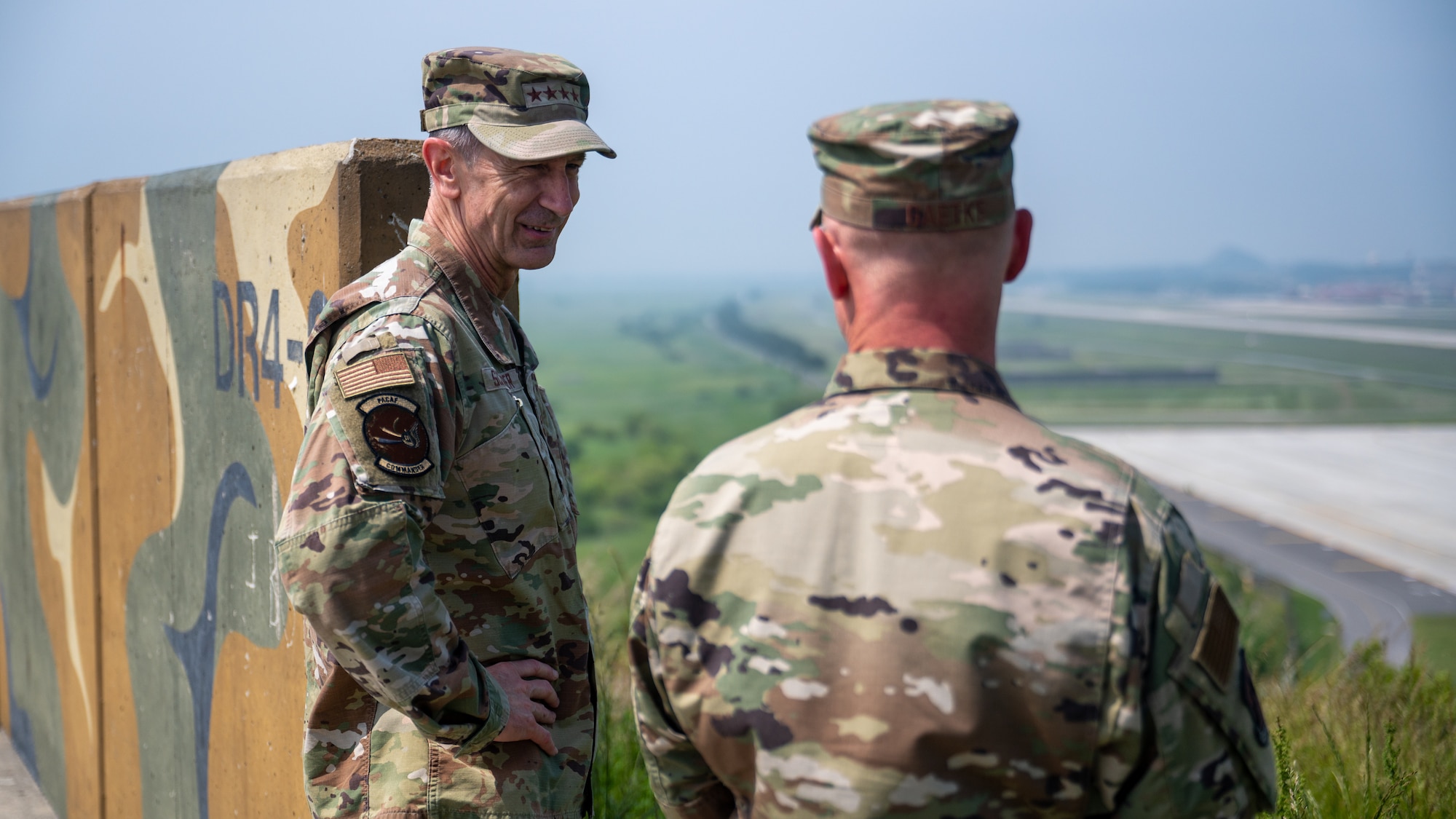 Gen. Kevin Schneider speaks with Col. Matthew Gaetke.