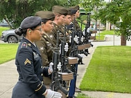 A ceremonial rifle detail stands ready to provide an appropriate salute for fallen servicemembers during a Memorial Day ceremony in downtown Augusta, Ga.