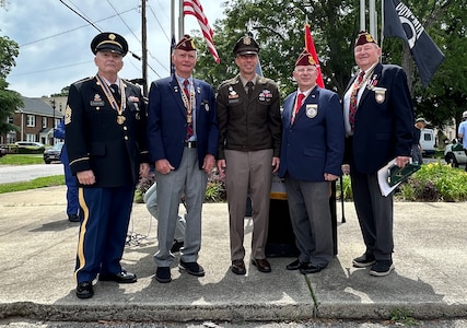 Commanding General Maj. Gen. Paul Stanton (3rd from left) poses with veterans after speaking at the Memorial Day event in downtown Augusta, Ga.