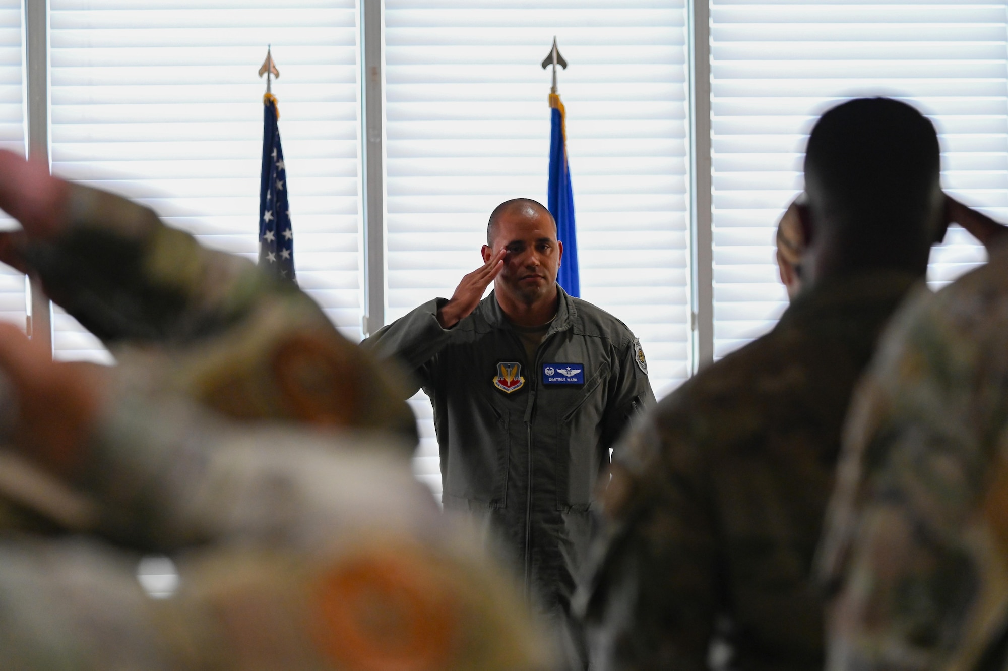 U.S. Air Force Lt. Col. Dimitrius Ward, 36th Electronic Warfare Squadron commander, renders his first salute to the Airmen of the 36th EWS during his assumption of command at Eglin Air Force Base, Florida, May 23, 2024. The 36th EWS is comprised of six flights: pod maintenance, special missions, legacy systems, air dominance, cybersecurity and IT, and advanced systems. (U.S. Air Force photo by Capt. Benjamin Aronson)
