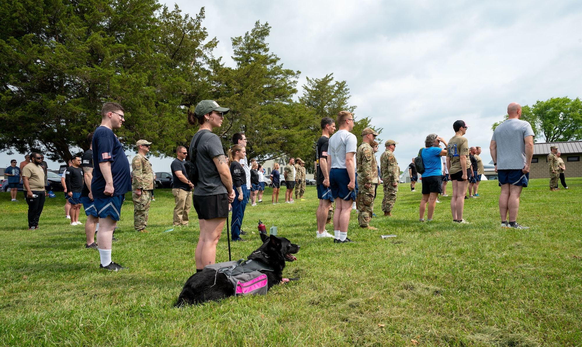Airmen from the 436th Aerial Port Squadron prepare for the Port Dawg Memorial Run at Dover Air Force Base, Delaware, May 23, 2024. The 2.2-mile run is held each year in honor of fallen members from aerial ports across the country. (U.S. Air Force photo by Senior Airman Amanda Jett)