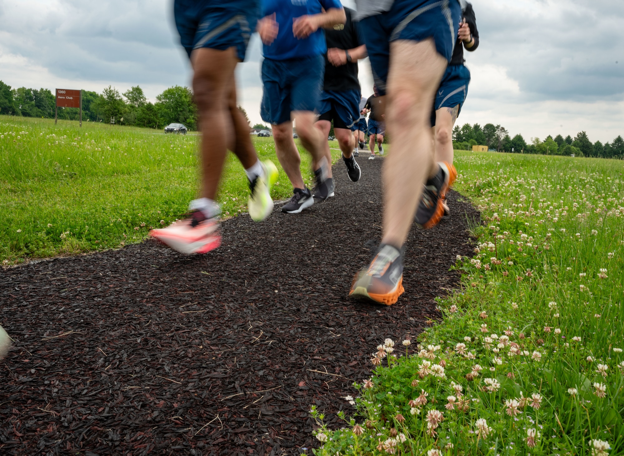 Airmen from the 436th Aerial Port Squadron participate in the annual Port Dawg Memorial Run at Dover Air Force Base, Delaware, May 23, 2024. The 2.2-mile run is held each year in honor of fallen members from aerial ports across the country. (U.S. Air Force photo by Senior Airman Amanda Jett)
