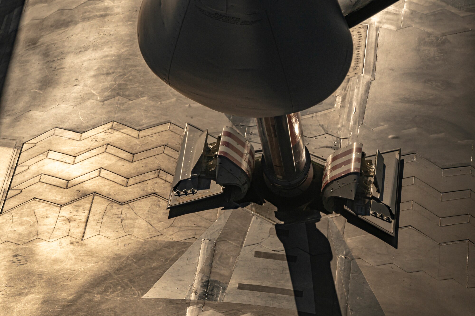 A U.S. Air Force F-22 Raptor receives fuel from an Air Force (914 ARW) KC-135 Stratotanker.