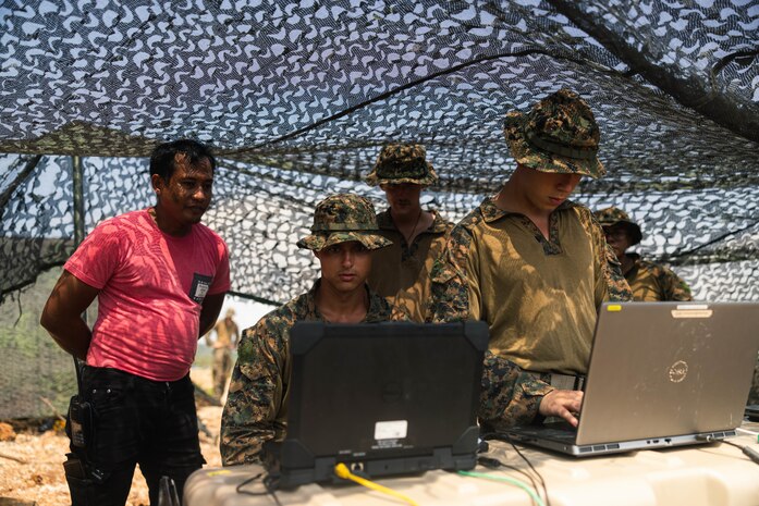 U.S. Marines with 3rd Marine Littoral Regiment, 3rd Marine Division, operate data systems during the Littoral Zone Reconnaissance Cobra exercise for Archipelagic Coastal Defense Continuum at Camp Cape Bojeador, Philippines, May 20, 2024. LZR Cobra is a bilateral command post exercise between the U.S. Marines with 3rd MLR and the Philippine Marines with the Coastal Defense Regiment and 4th Marine Brigade aimed at enhancing interoperability, refining tactics, techniques, and procedures, and supporting combined and joint force maritime domain awareness. ACDC is a series of bilateral exchanges and training opportunities between U.S. Marines and Philippine Marines aimed at bolstering the Philippine Marine Corps’ Coastal Defense strategy while supporting the modernization efforts of the Armed Forces of the Philippines. (U.S. Marine Corps photo by Cpl. Eric Huynh)