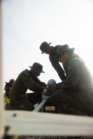 U.S. Marines with 3rd Marine Littoral Regiment, 3rd Marine Division, conduct pre-flight checks on the Stalker VXE30 unmanned aerial system during the Littoral Zone Reconnaissance Cobra exercise for Archipelagic Coastal Defense Continuum at Camp Cape Bojeador, Philippines, May 20, 2024. LZR Cobra is a bilateral command post exercise between the U.S. Marines with 3rd MLR and the Philippine Marines with the Coastal Defense Regiment and 4th Marine Brigade aimed at enhancing interoperability, refining tactics, techniques, and procedures, and supporting combined and joint force maritime domain awareness.  ACDC is a series of bilateral exchanges and training opportunities between U.S. Marines and Philippine Marines aimed at bolstering the Philippine Marine Corps’ Coastal Defense strategy while supporting the modernization efforts of the Armed Forces of the Philippines. (U.S. Marine Corps photo by Cpl. Eric Huynh)