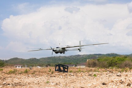 A Stalker VXE30 unmanned aerial system performs a vertical take-off during the Littoral Zone Reconnaissance Cobra exercise for Archipelagic Coastal Defense Continuum at Camp Cape Bojeador, Philippines, May 20, 2024. LZR Cobra is a bilateral command post exercise between the U.S. Marines with 3rd MLR and the Philippine Marines with the Coastal Defense Regiment and 4th Marine Brigade aimed at enhancing interoperability, refining tactics, techniques, and procedures, and supporting the combined and joint force maritime domain awareness. ACDC is a series of bilateral exchanges and training opportunities between U.S. Marines and Philippine Marines aimed at bolstering the Philippine Marine Corps’ Coastal Defense strategy while supporting the modernization efforts of the Armed Forces of the Philippines. (U.S. Marine Corps photo by Cpl. Eric Huynh)