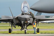 U.S. Air Force Capt. Melanie “MACH” Kluesner, F-35A Lightning II Demonstration Team pilot and commander, exits an F-35A before the 2024 First State Airshow at Dover Air Force Base, Delaware, May 16, 2024. The First State Airshow was a free, two-day event open to the public that featured 23 static displays and 18 aerial performers. (U.S. Air Force photo by Airman Liberty Matthews)