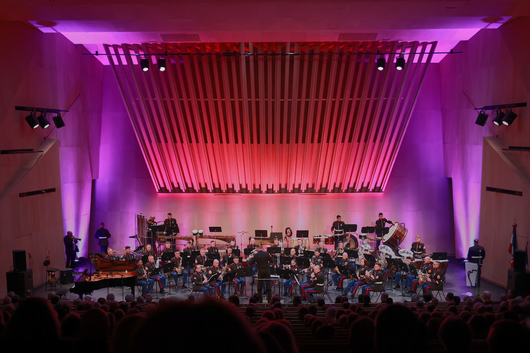 U.S. Marines with 2nd Marine Division band, perform at the La Cité de la musique et de la Danse, Soisson, France, May 25, 2024. The memorial concert was held in commemoration of the 105th anniversary of the battle of Belleau Wood, conducted to honor the legacy of service members who gave their lives in defense of the United States and European allies. (U.S. Marine Corps photos by Cpl. Addysyn Tobar)