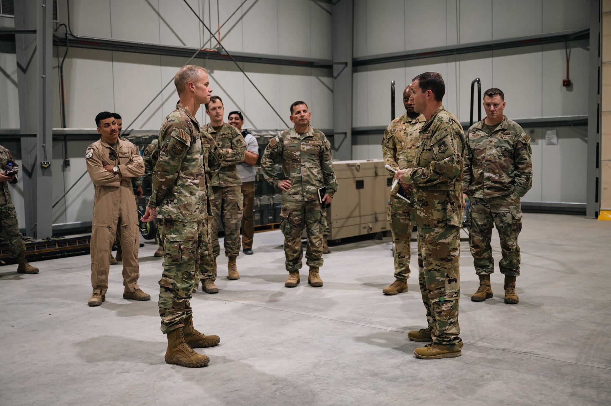 U.S. Air Force Lt. Gen. Derek France, speaks with Lt.
Col. Jay Hessenthaler, commander of the
46th Expeditionary Attack Squadron