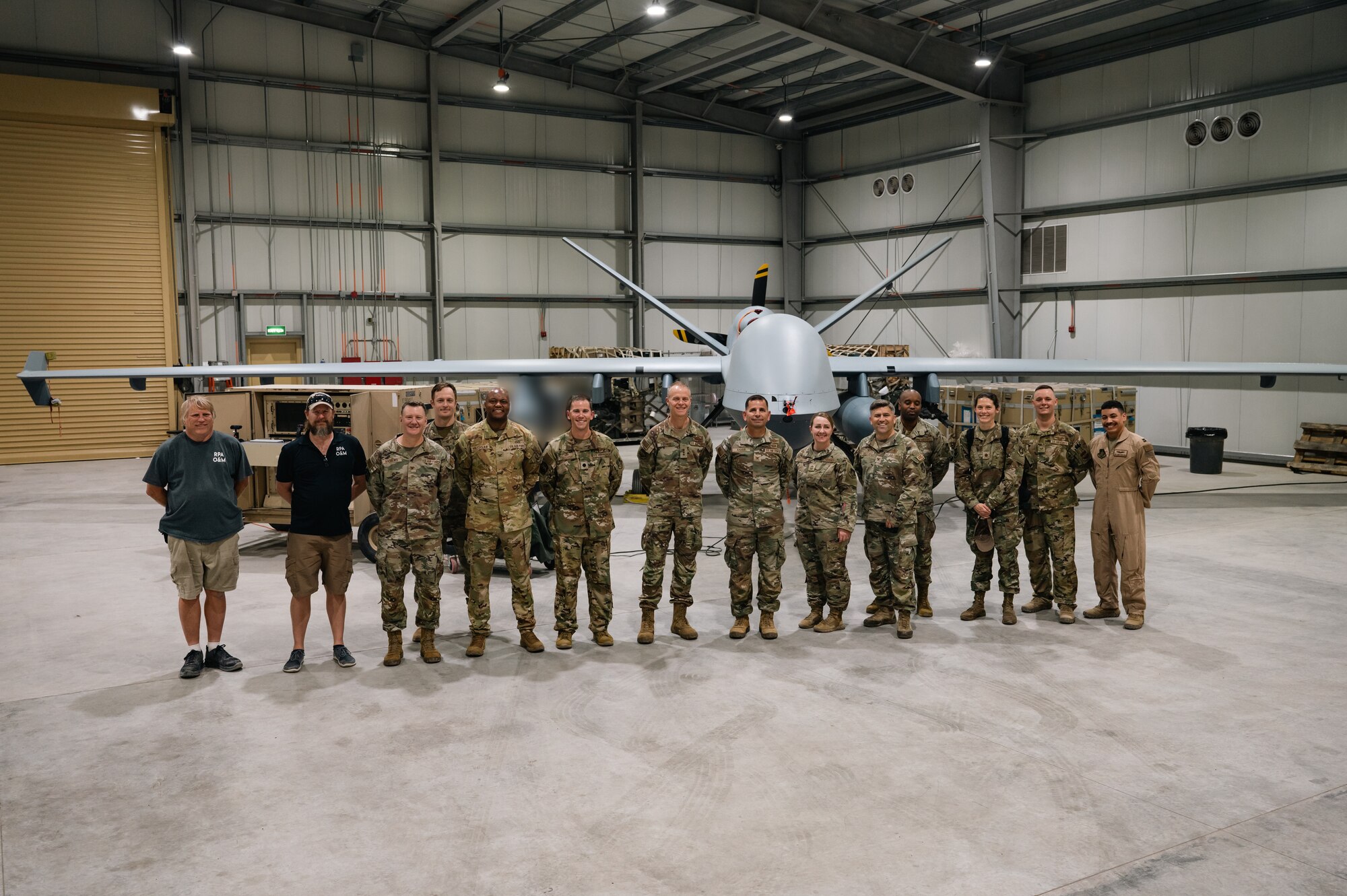 U.S. Air Force Lt. Gen. Derek France
poses for a group photo with Airmen and DoD
civilians from the 46th Expeditionary Attack
Squadron