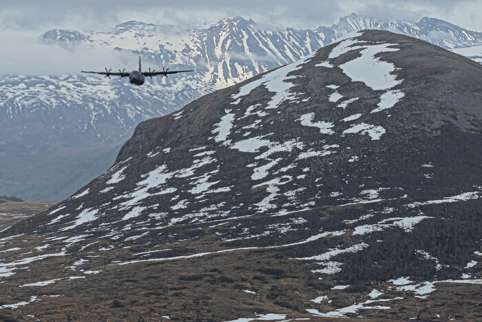 A C-130J Super Hercules assigned Little Rock Air Force Base, Arkansas, flies over mountains in Norway, May 9, 2024. The C-130J Super Hercules serves as a cornerstone of strategic collaboration among Allies. Joint training exercises, logistical support missions, and cross-border operations help to foster a robust network of defense cooperation, enhancing our collective ability to respond swiftly and effectively to emerging challenges.
