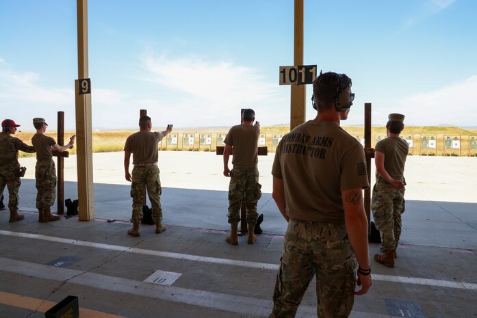 Beale Air Force Base Airmen compete in a pistol Excellence-in-Competition, held by the 9th Security Forces Squadron, with the 9mm striker-fired SIG M18 at Beale AFB, Calif., May 14, 2024.