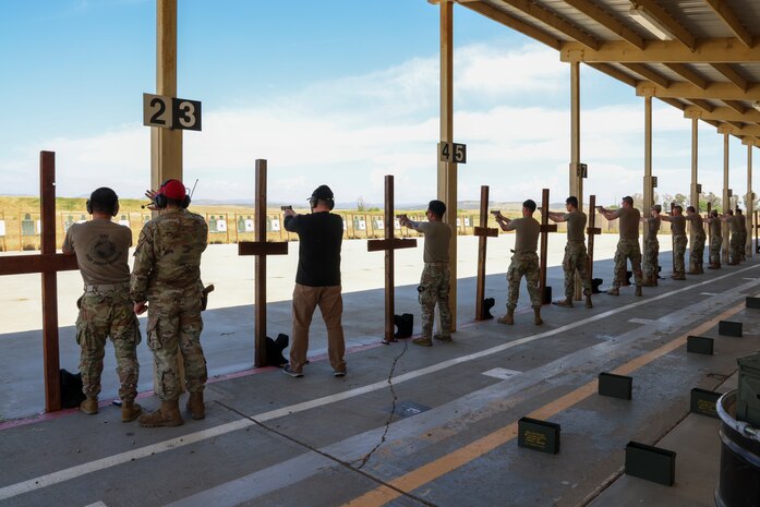 Beale Air Force Base Airmen compete in a pistol Excellence-in-Competition, held by the 9th Security Forces Squadron, with the 9mm striker-fired SIG M18 at Beale AFB, Calif., May 14, 2024.