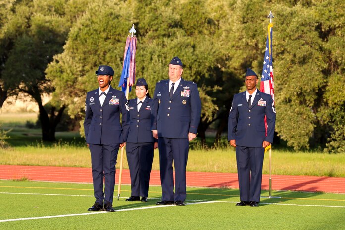 U.S. Air Force Master Sgt. Jacqui Isom, 553rd Intelligence Squadron first sergeant, call commands as the Master of Drill and Ceremony for the 9th Mission Support Group open ranks, while standing with the 9th MSG leadership including Chief Master Sgt. Sheldon Curl, 9th MSG senior enlisted leader (right), Col. James Peterson, 9th MSG commander, and 2nd Lt. Laura Werer, 9th MSG executive officer, at Beale Air Force Base, California, April 10, 2024.