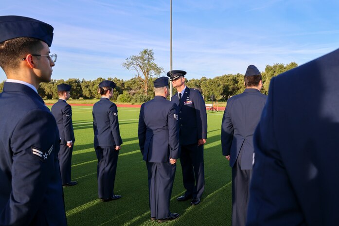 U.S. Air Force Maj. Joshua Larson, 9th Communications Squadron commander, inspects members of the 9th CS during the 9th Mission Support Group open ranks inspection at Beale Air Force Base, California, April 10, 2024.