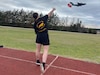 Sgt. Bianca Hayden with a superb one-armed discus throw