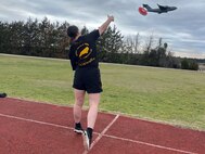 Sgt. Bianca Hayden with a superb one-armed discus throw