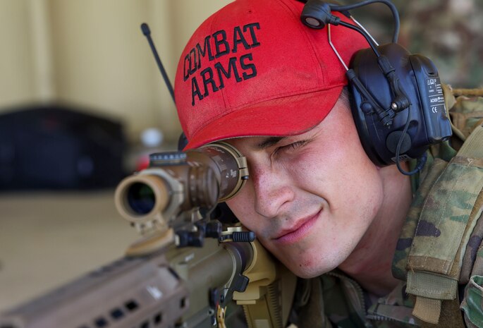 U.S. Air Force Staff Sgt. Michael Ionin, 9th Security Forces Squadron, NCO in charge of combat arms, lines up a shot with the M110A1 rifle at Beale Air Force Base, California, April 11, 2024.